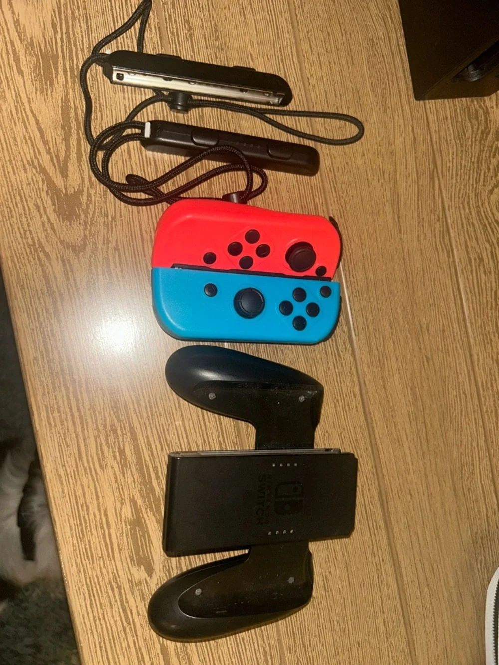 Nintendo Switch with Red, Blue, Black Graphic Controller Wraps